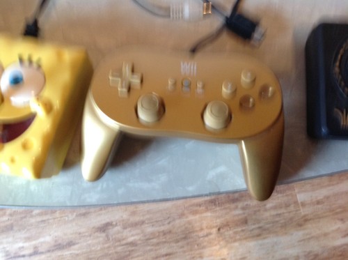 LOT OF 4 GAME CONTROLERS