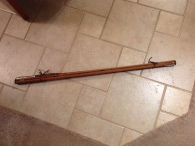 wooden fishing pole