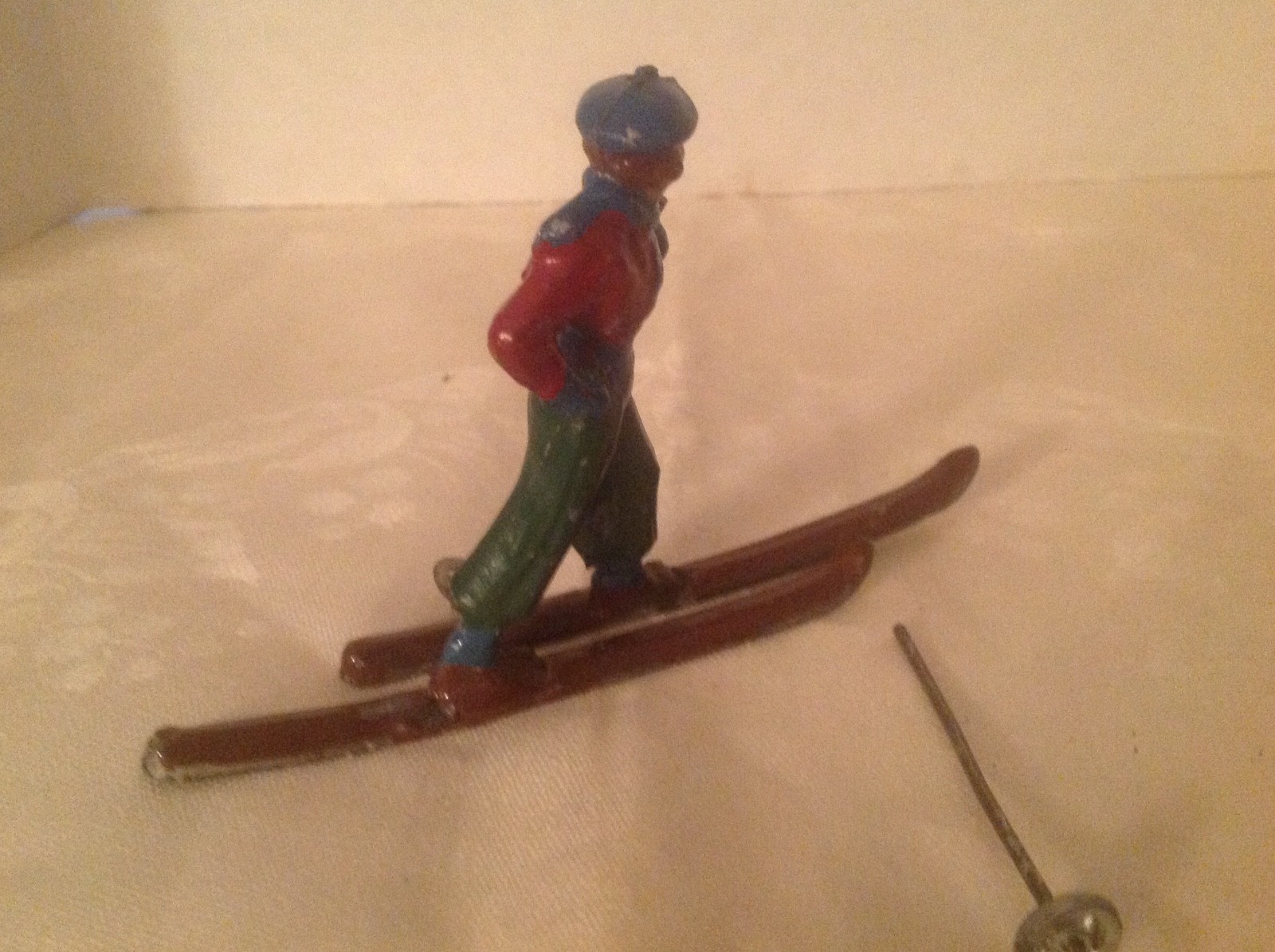 Vintage lead skier marked made in France red jacket blue pants blue hat
