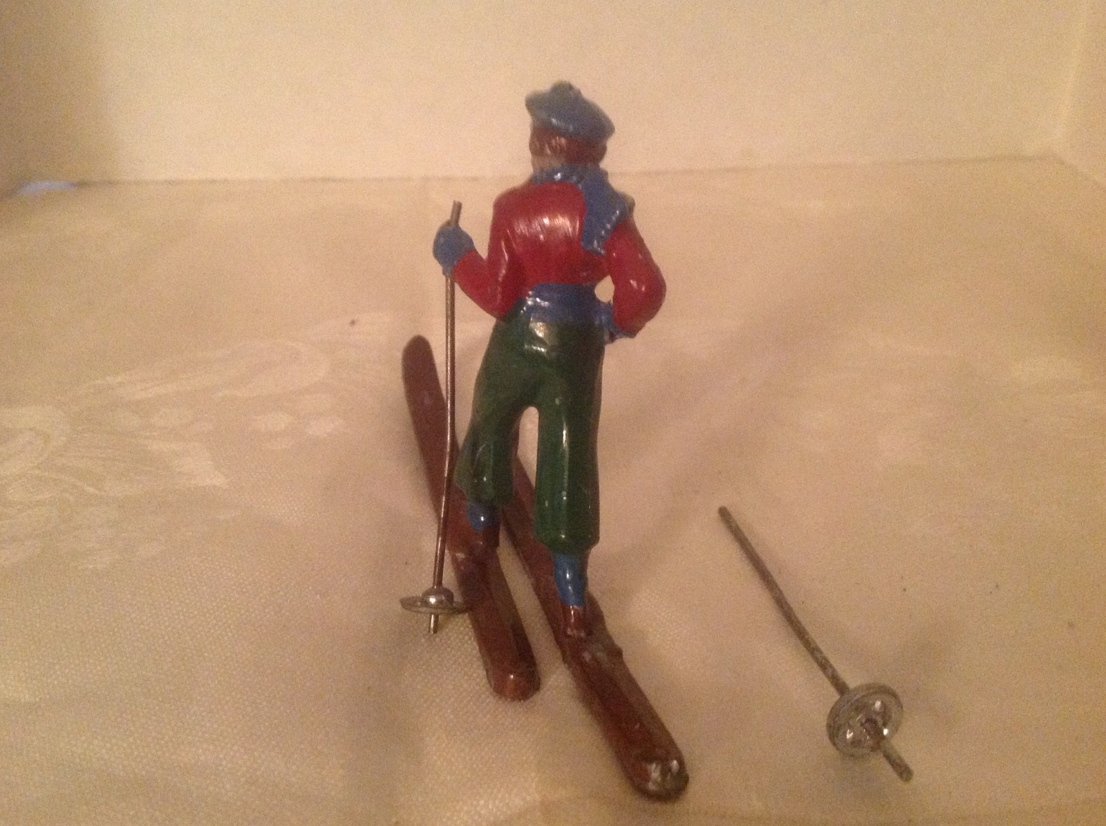 Vintage lead skier marked made in France red jacket blue pants blue hat