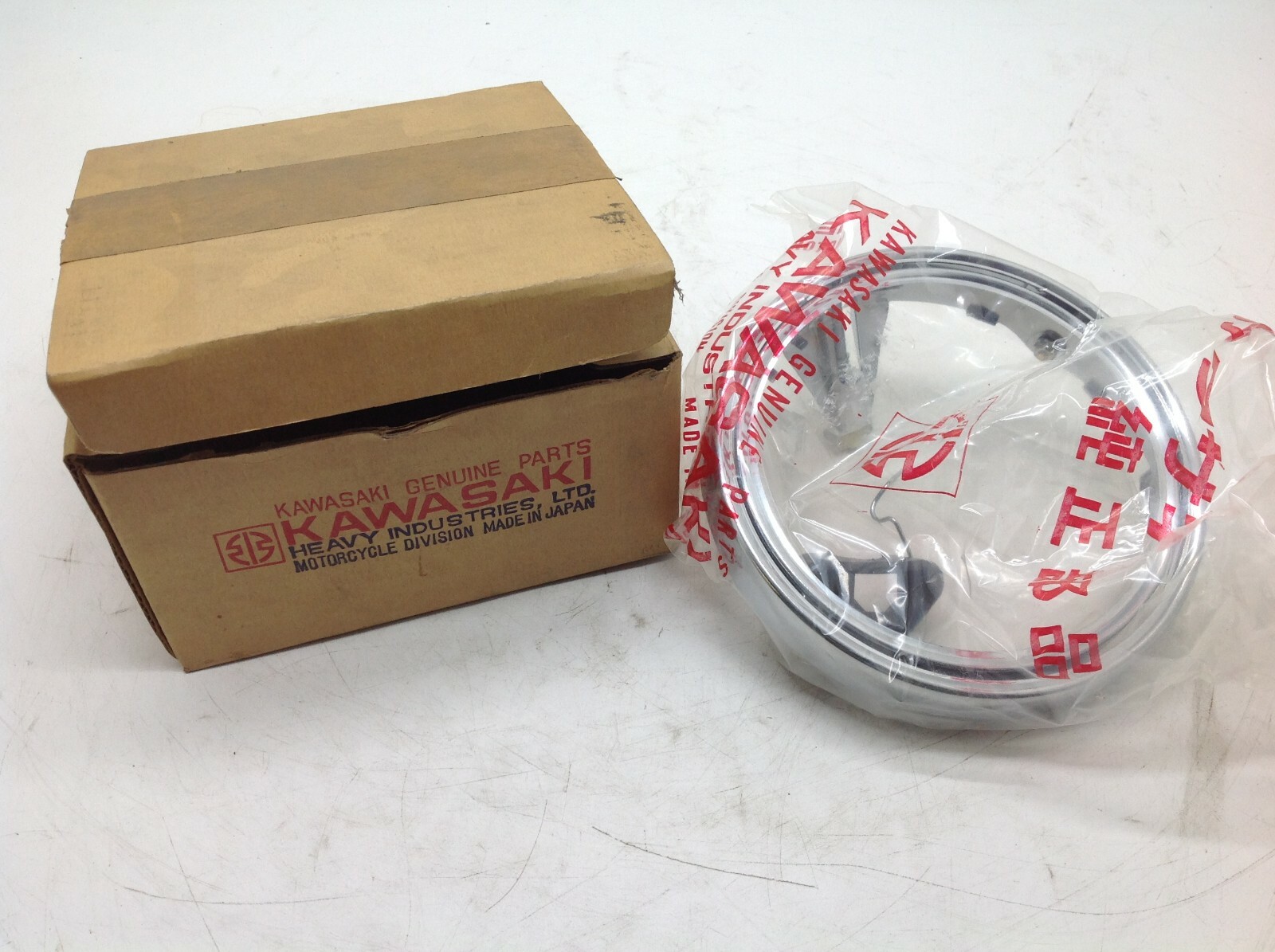Kawasaki KE125 KS125 1974 75 New OEM Head Lamp Light Rim