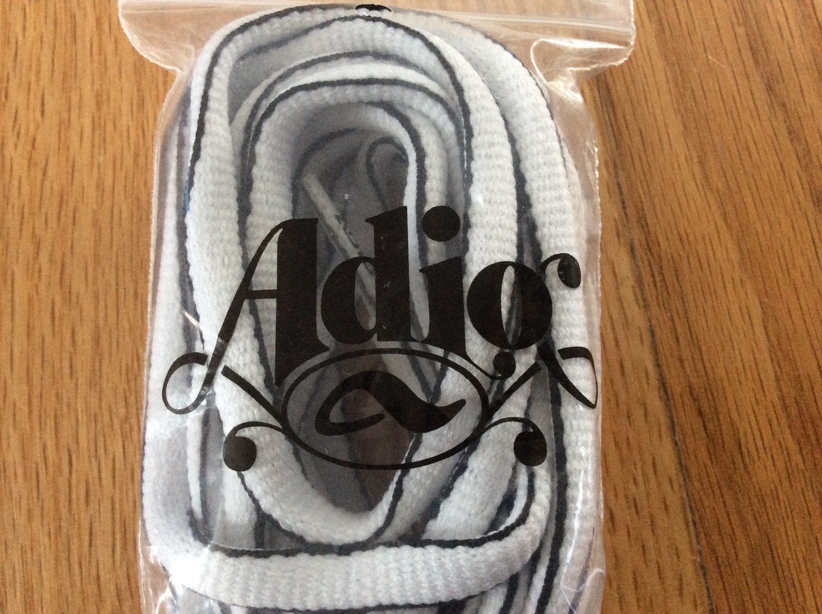 Adio replacement shoe laces new in package black and white logo aglets 60