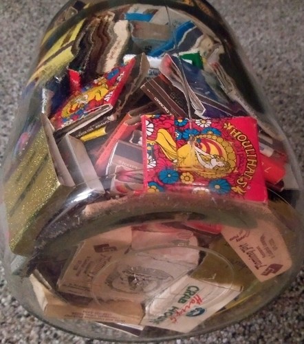 Antique Farmhouse clear glass jug filled with vintage matchbooks