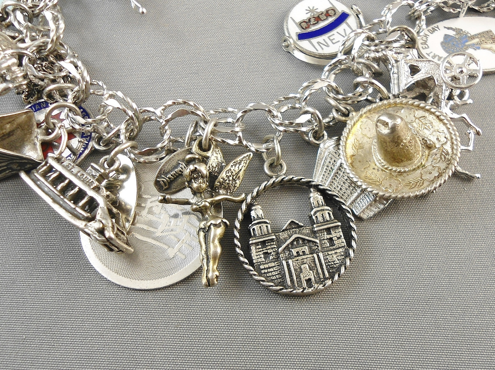 VINTAGE STERLING SILVER CHARM BRACELET 23 CHARMS 76 GRAMS 7 1/4 INCHES