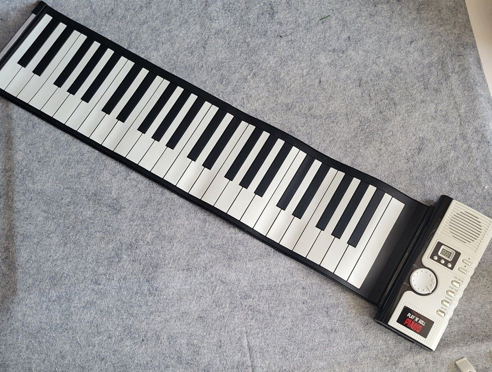 The Sharper Image Play N Roll Digital Piano Electronic Keyboard -Tested Working