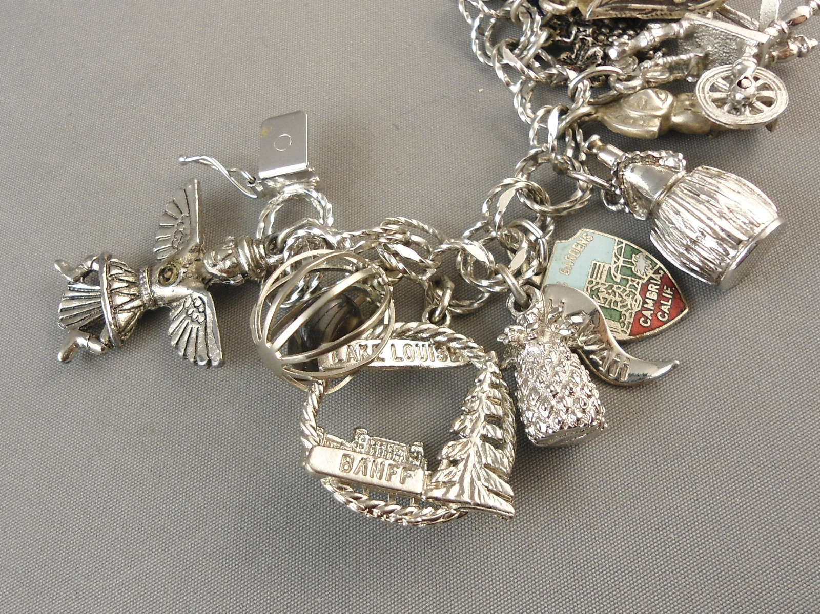 VINTAGE STERLING SILVER CHARM BRACELET 23 CHARMS 76 GRAMS 7 1/4 INCHES