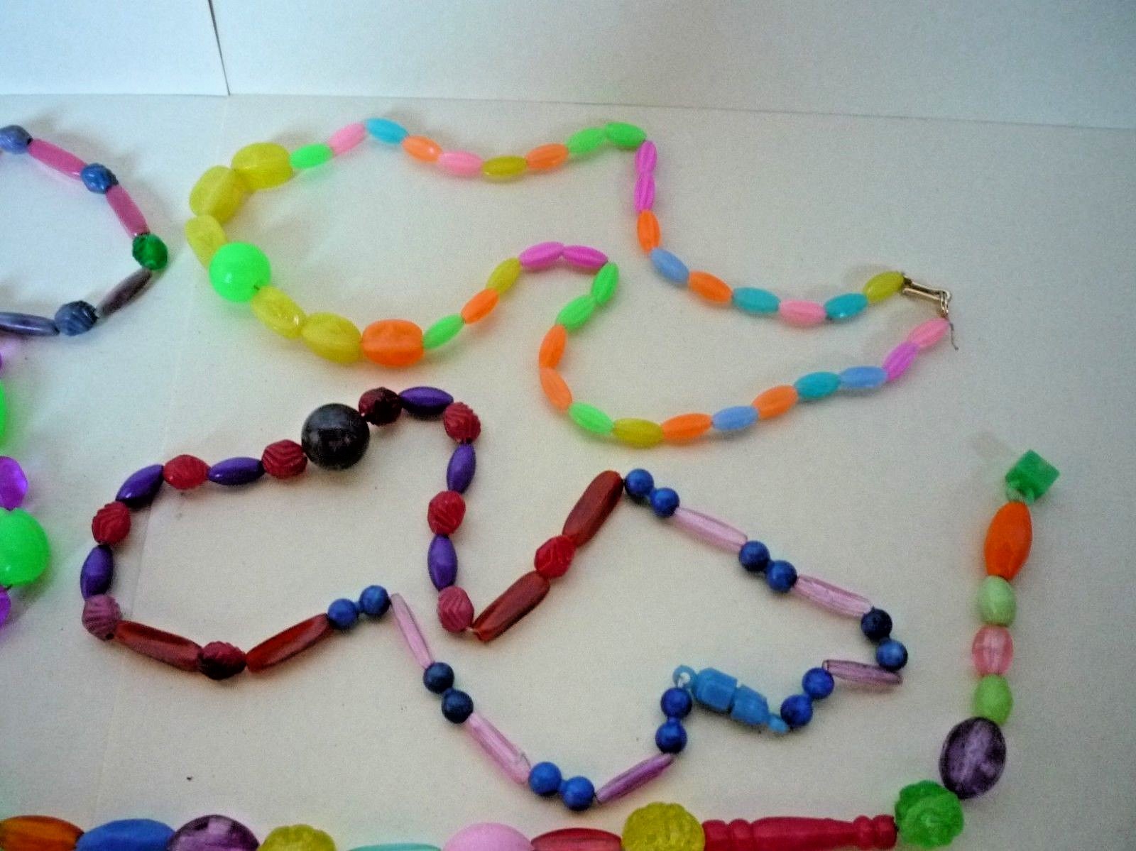 5 Strings, 15” to 17” of Colorful Plastic Beads