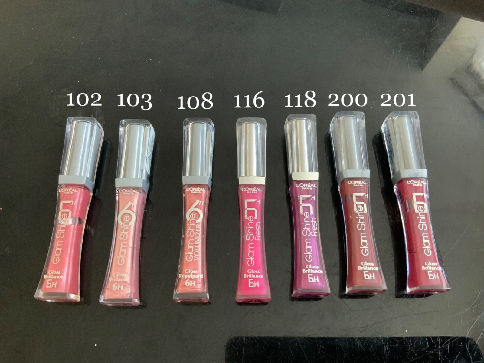 Блеск для губ too glam to shine. Glam shine lip gloss. блеск для губ loreal glam shine. блеск для губ лореаль. лореаль блеск в тюбике.