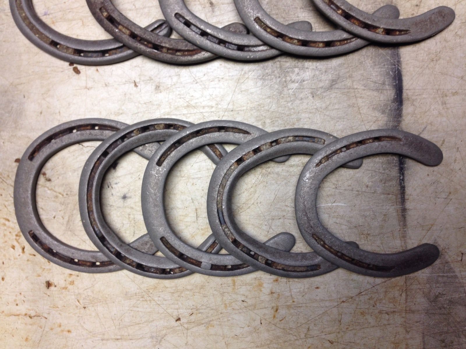 10 Used Rustic & Refurbished  Metal Horse Shoes Nails pulled and flattened out