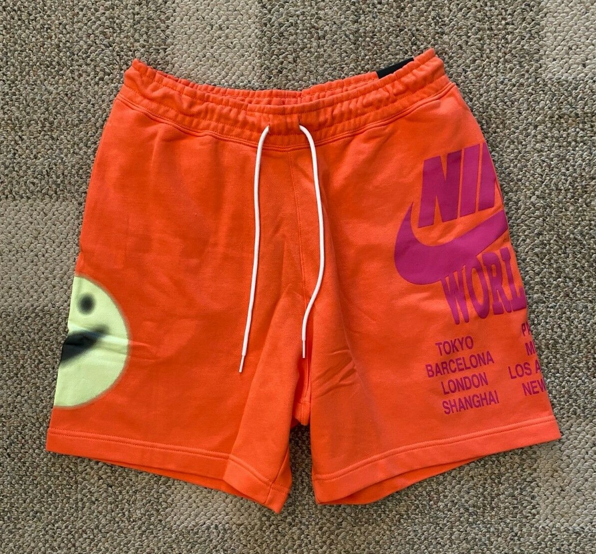 pantalon corto nike world tour