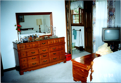 Tv on dresser with mirror outlet