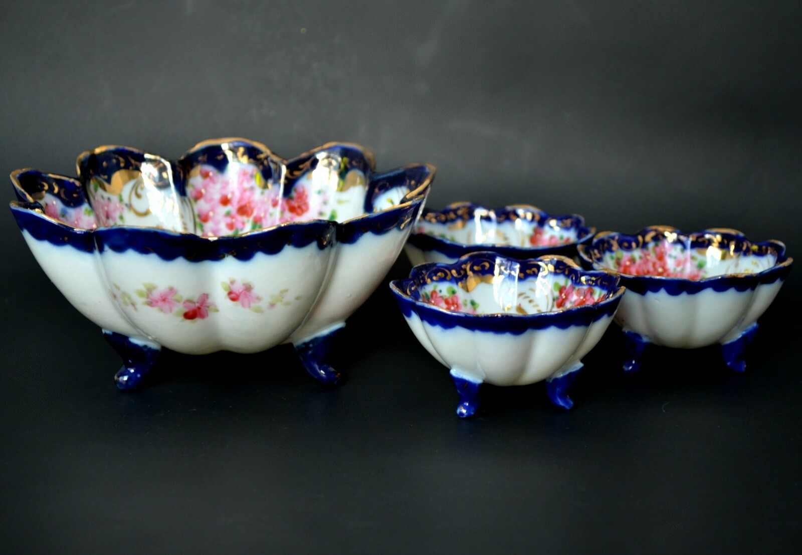 Set of 4 bowls Japan porcelain hand painted flow blue footed fruit nut dishes