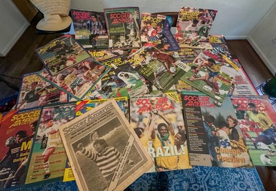 27 Soccer America magazines from the 1990's and one from 1984