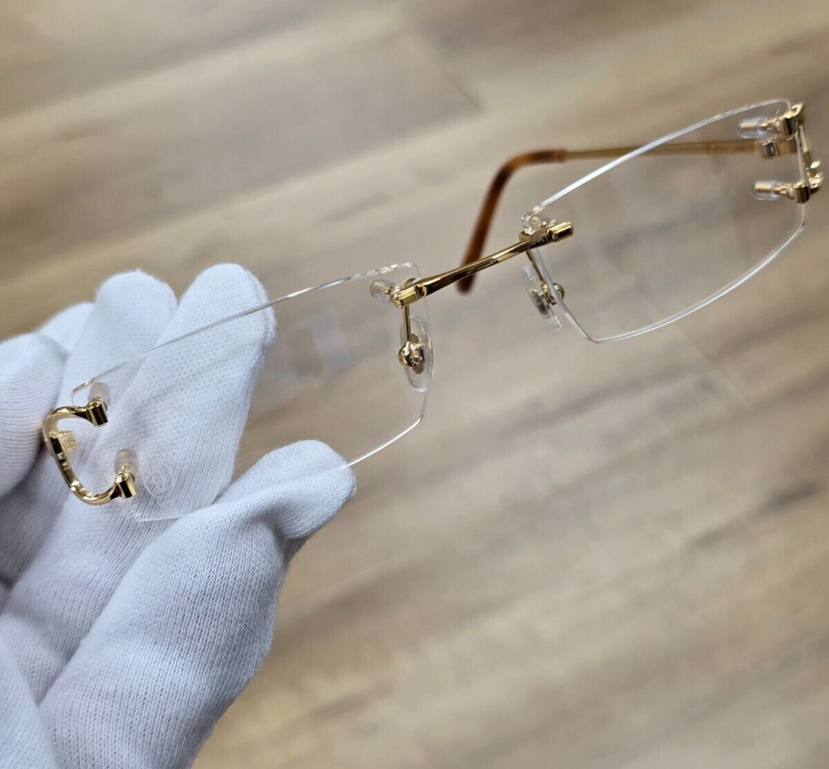 CARTIER CARTIER RECTANGULAR RIMLESS 53MM GOLD UNISEX EYEGLASSES CT0092O 001