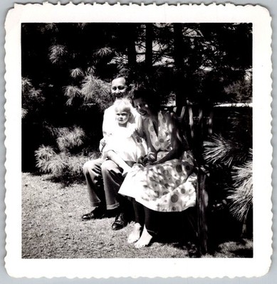 Vtg B&W Snapshot Smiling Family Man Woman Child Polka Dot Dress Bench Pines