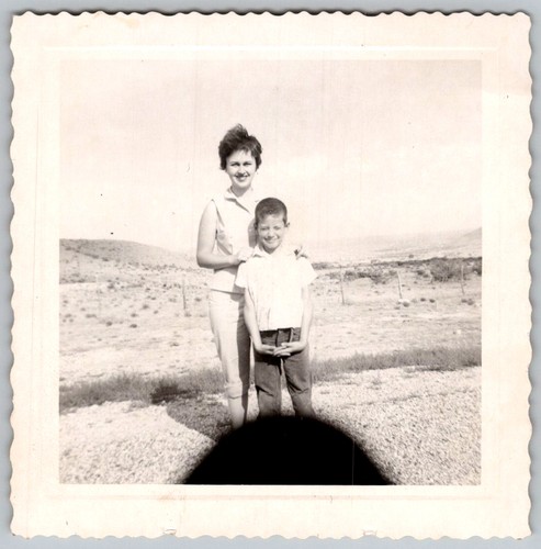 Vtg B&W Snapshot Smiling Mother & Son Outdoors Arid Desert Landscape Hills 1960s