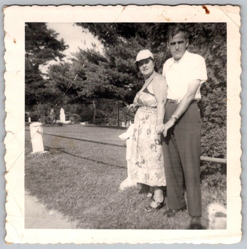 Vtg B&W Snapshot Woman In Floral Dress & Hat With Man In Park Landscape 1950s