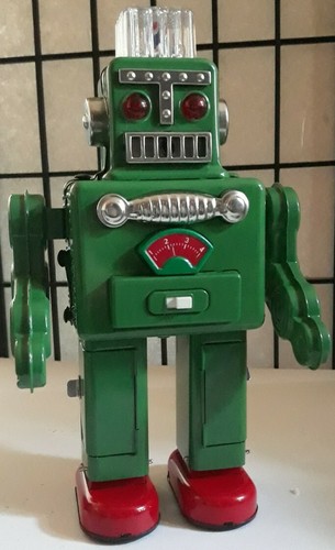 Smoking Spaceman Battery Operated Robot Reproduction GREEN