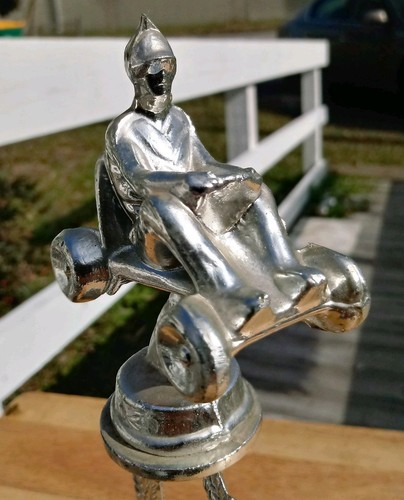 vintage gocart racing metal trophy with wood base. 10