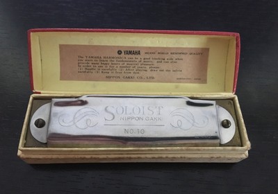 vintage pre 1980 harmonica red