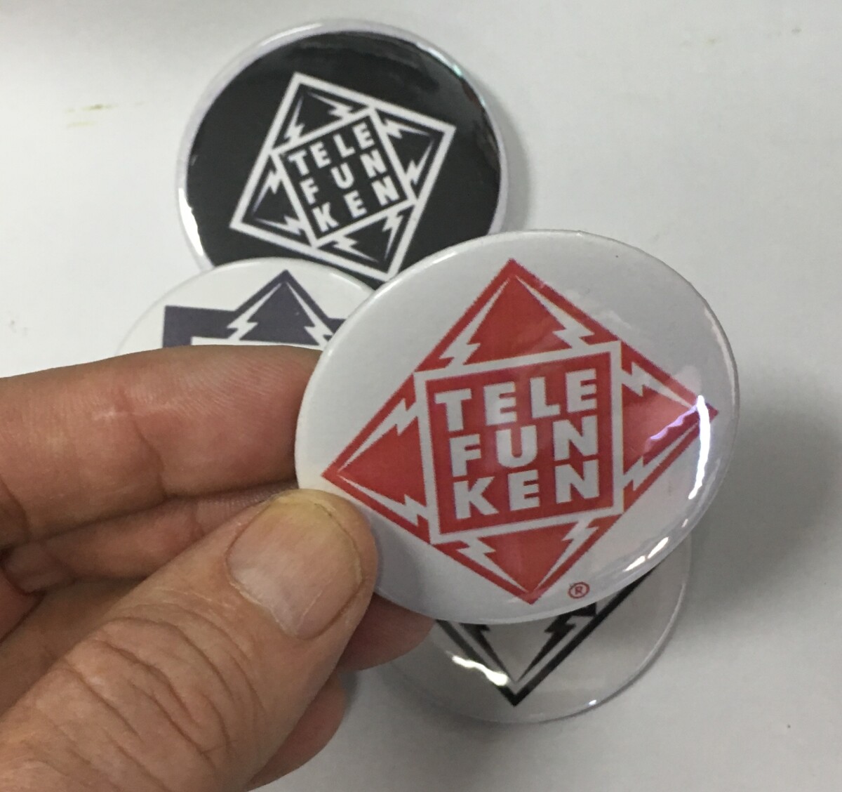 (4) Different NOS Vintage Telefunken logo badges possibly dealer - BUY IT NOW!