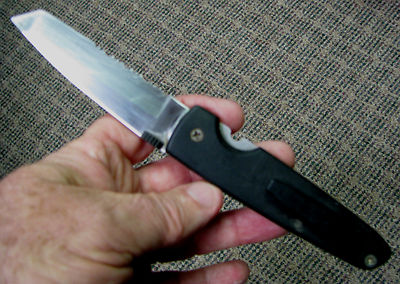 Locking blade knife, w part serated blade, stainless blade made by Sharp Eagle