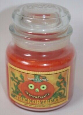 RARE YANKEE CANDLE TRICK OR TREAT CANDLE 14.5 OZ. GLOW IN THE DARK LABEL