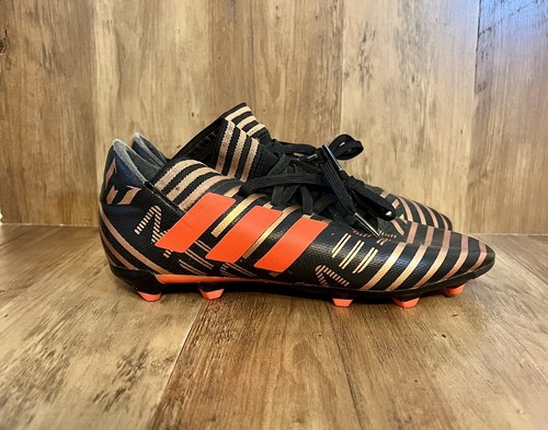 messi cleats black and gold