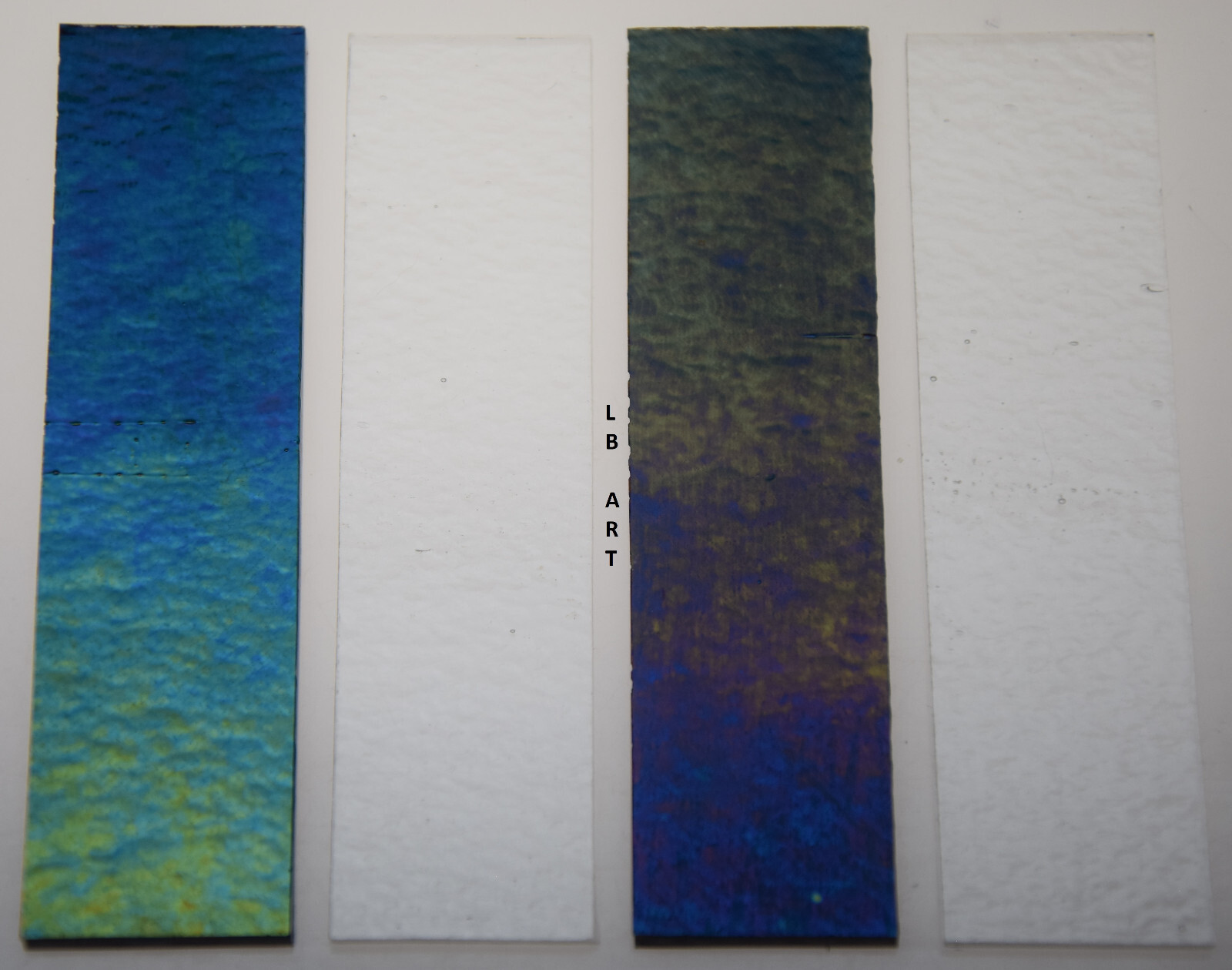 1108.31-1" x 4" 2 IRIDIZED AQUAMARINE BLUE & 2 CLEAR BULLSEYE 3mm GLASS 90 COE