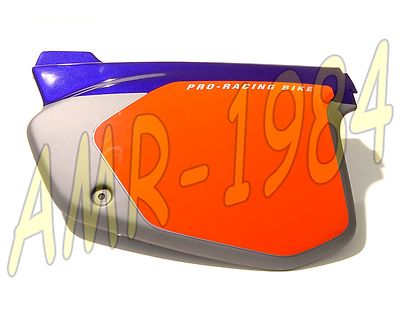 FIANCHETTO PORTANUMERO LATERALE SX APRILIA RX 50 94 COLORE BLU GRIGIO  AP8231927