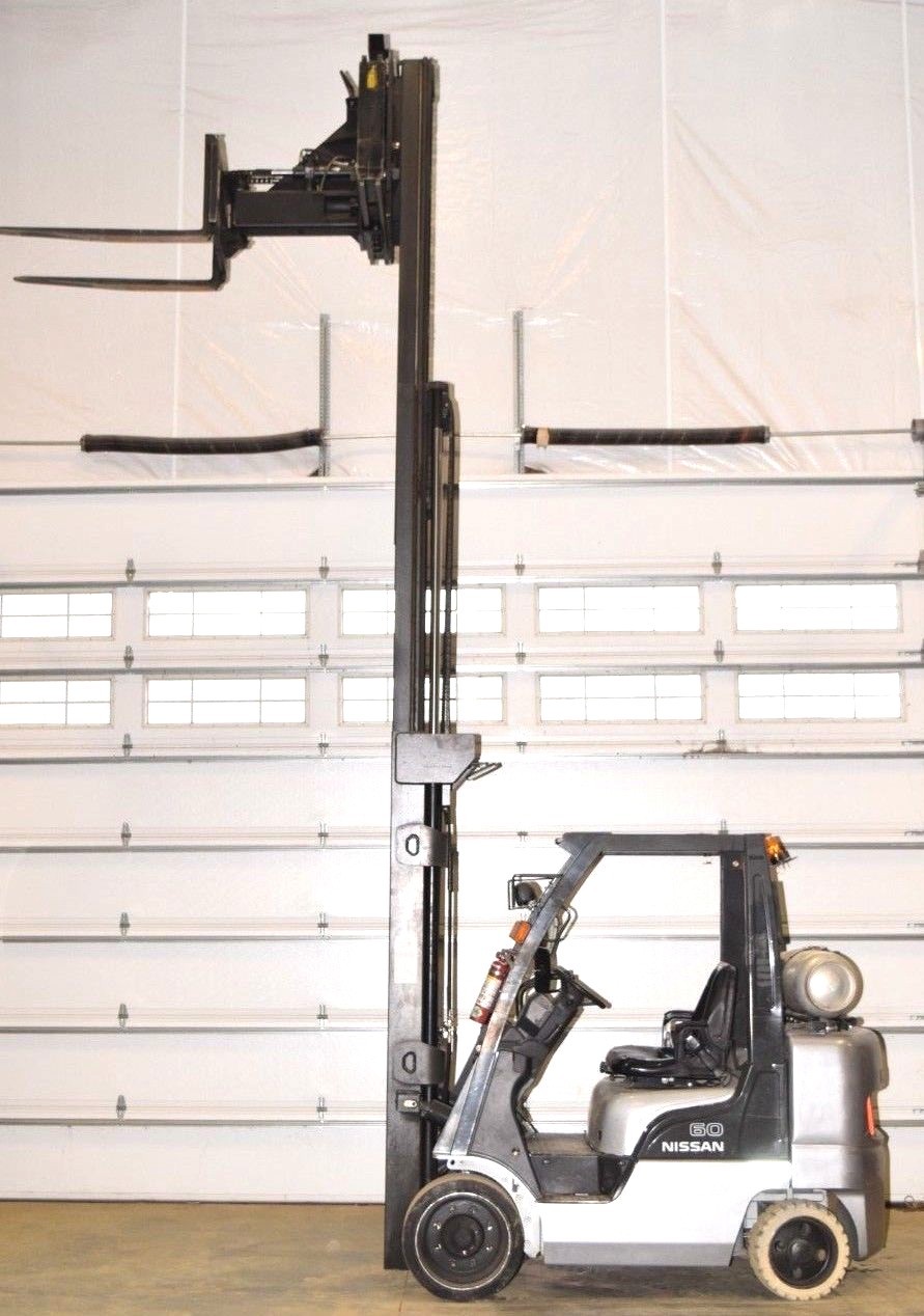 Nissan 60 fork lift 6000 # capacity articulating forks & side shift LOW HOURS