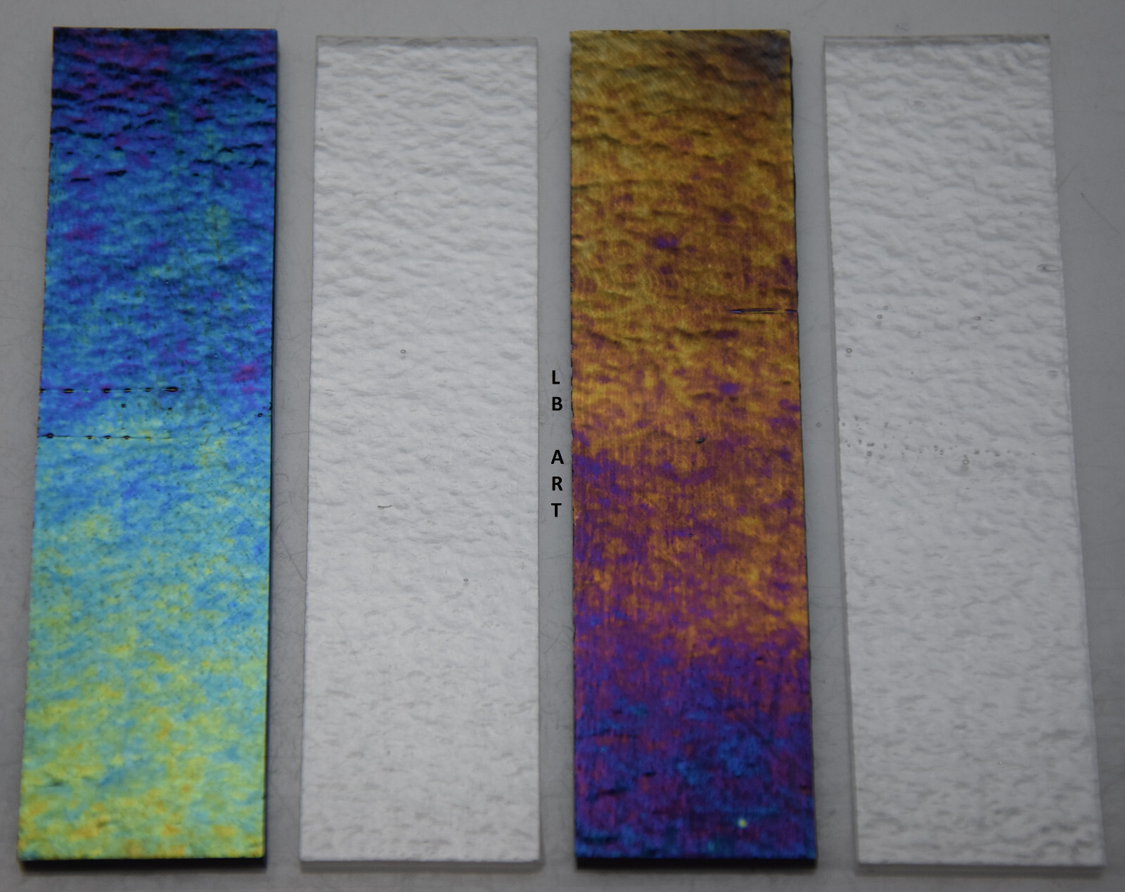 1108.31-1" x 4" 2 IRIDIZED AQUAMARINE BLUE & 2 CLEAR BULLSEYE 3mm GLASS 90 COE