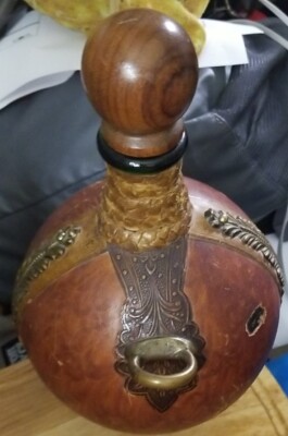 Green Glass Bottle Wrapped With Ornate Leather Wooden Topped Cork And Brass...