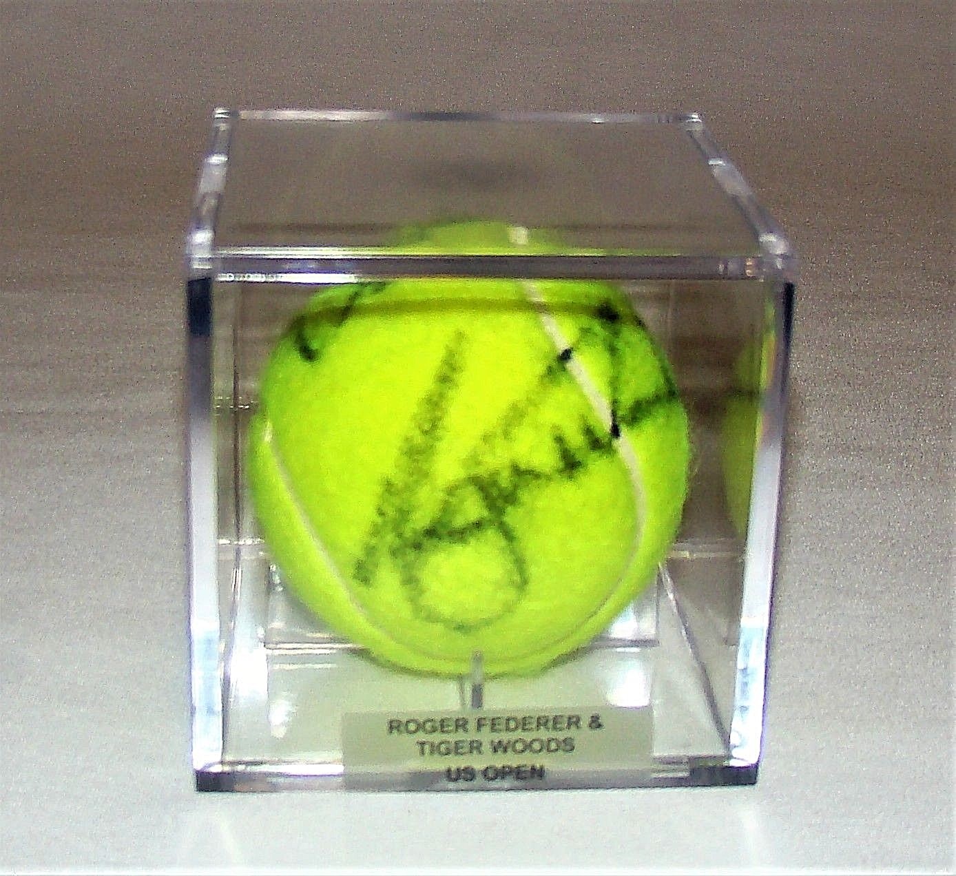 TIGER WOODS & ROGER FEDERER DUAL AUTOGRAPHED TENNIS BALL