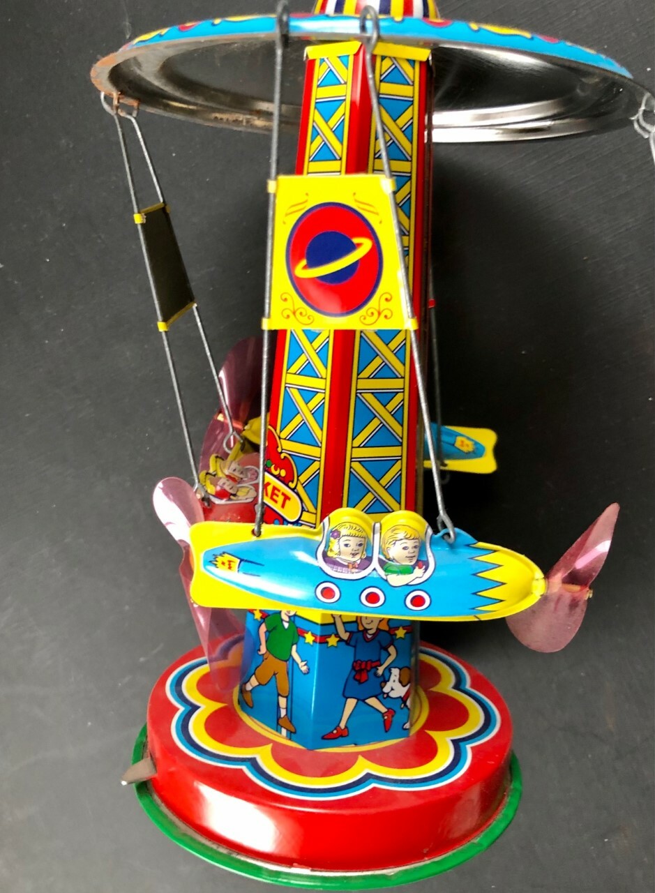 Купить Детская игрушка 2000 Schylling ROCKET RIDE CAROUSEL Tin Toy