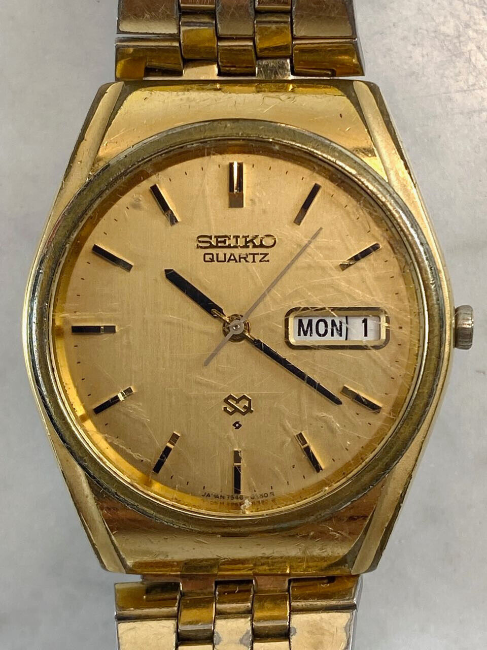 Vintage SEIKO SQ Gold Tone Oyster Watch. Day Date 4 Jewels Vintage SEIKO SQ Gold Tone Oyster Watch. Day Date 4 Jewels