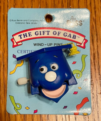 NEW VTG GRADUATE RUSS WIND-UP PIN THE GIFT OF GAB BLUE NOVELTY JEWELRY