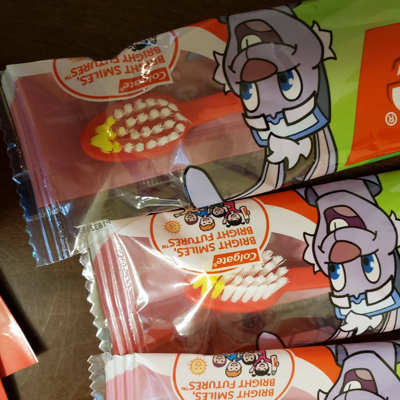 Lot of 58 Colgate Bright Smiles Bright Futures Kids Toothbrushes & 58 Toothpaste