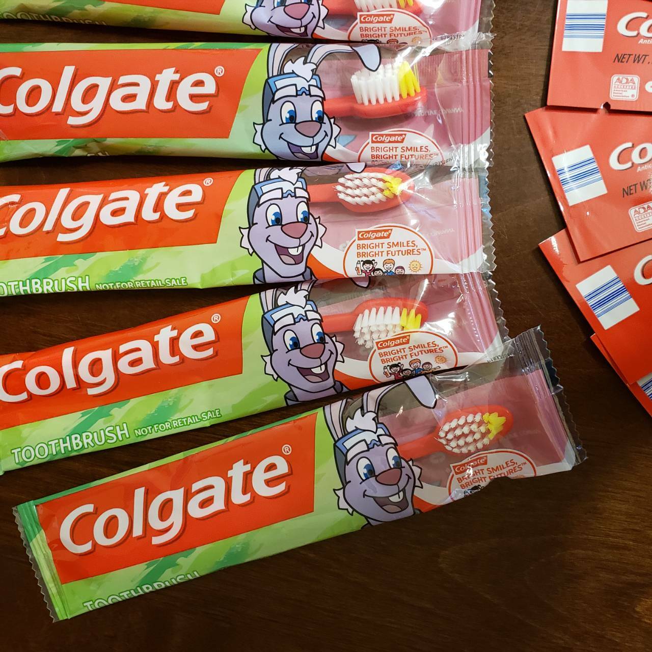 Lot of 58 Colgate Bright Smiles Bright Futures Kids Toothbrushes & 58 Toothpaste