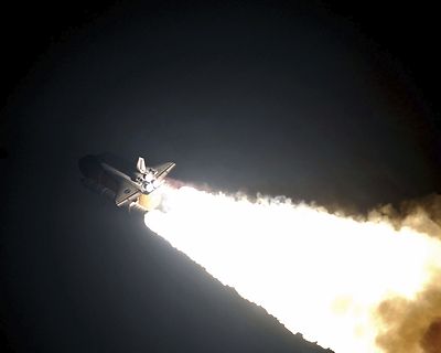 Space Shuttle Endeavour lifts off night launch for STS-123 mission Photo Print