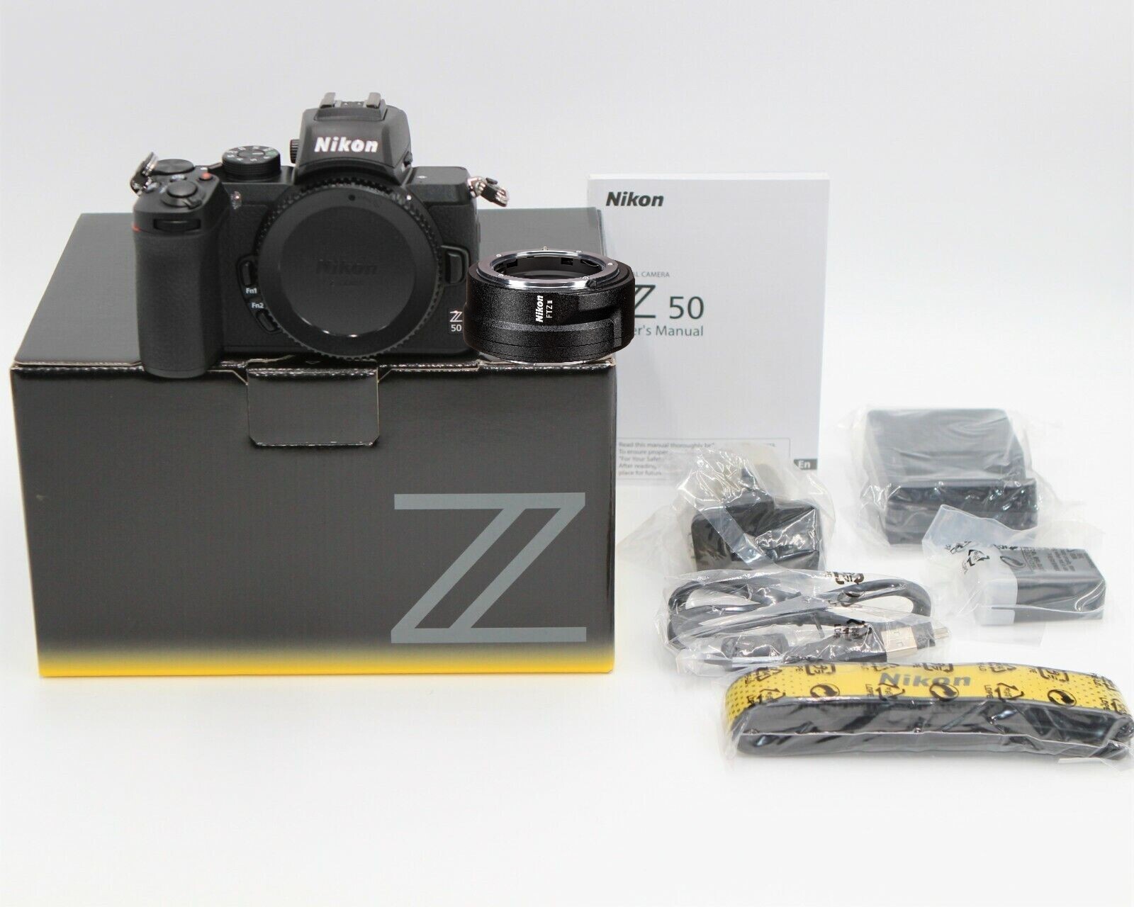 Nikon - Nikon Z50ボディ FTZのセット Amazon.com : Nikon Z50 + FTZ Mirrorless Camera Kit (209