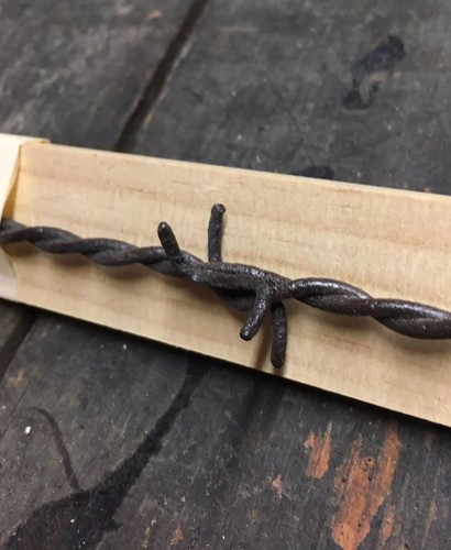 702B. Scutt Chair Barb Antique Barbed Wire