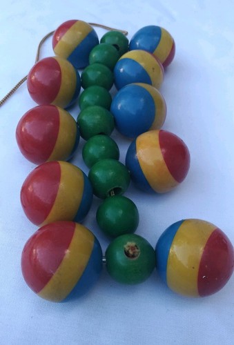Vintage Wooden Rolling Pull Toy Primary Colors Jointed Roller Toy