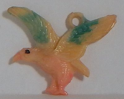 VINTAGE CELLULOID FLYING BIRD CHARM JAPAN CRACKER JACK