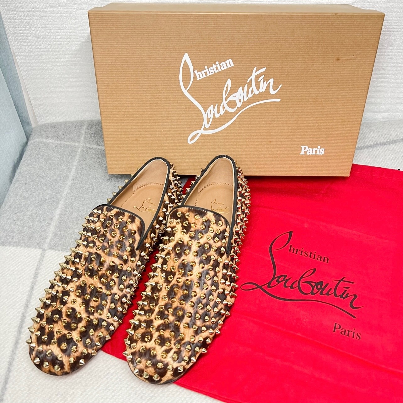 Christian Louboutin Rollerboy spikes flat pony Leopard Christian Louboutin Rollerboy spikes flat pony Leopard