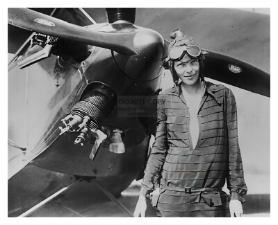 AMELIA EARHART AMERICAN AVIATRIX PILOT POSING WITH PLANE 8X10 PHOTO