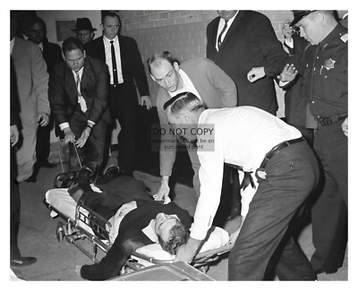LEE HARVEY OSWALD ON STRETCHER AFTER BEING SHOT BY JACK RUBY JFK 8X10 PHOTO