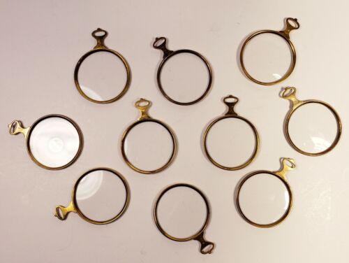 Lot of 10 antique/vintage trial lenses optical test lens pendants. Brass.