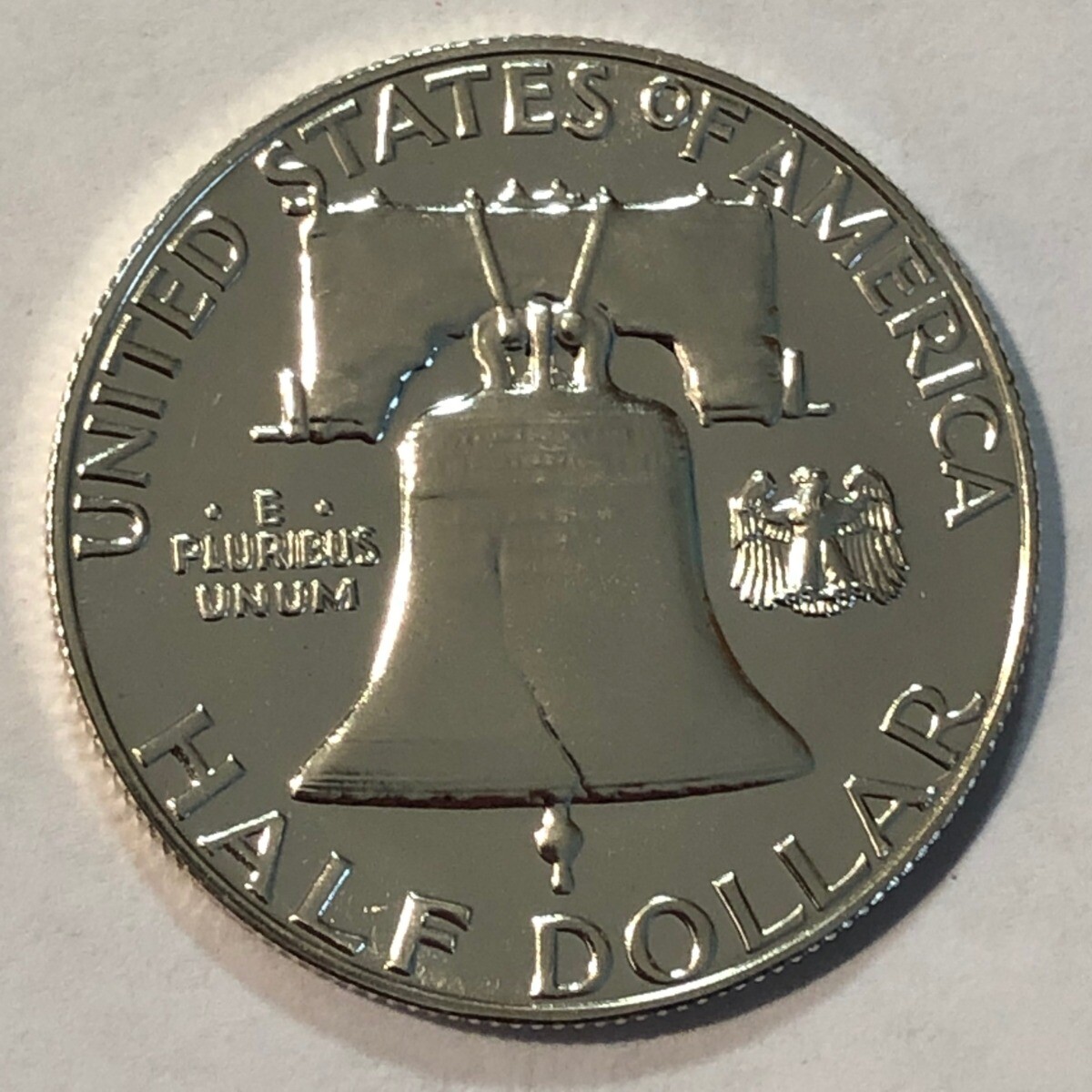 1963 gem PROOF Franklin silver half dollar. some toning.