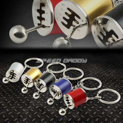 ГОНОЧНЫЙ АВТОМОБИЛЬ С 6-СТУПЕНЧАТОЙ МЕХАНИЧЕСКОЙ КОРОТКОЙ РУЧКОЙ ПЕРЕКЛЮЧЕНИЯ ПЕРЕДАЧ, МЕТАЛЛИЧЕСКИЙ БРЕЛОК ДЛЯ КЛЮЧЕЙ, КОЛЬЦО ДЛЯ КЛЮЧЕЙ